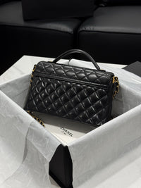Chanel – Top Handle Flap Bag (Black Lambskin Leather)