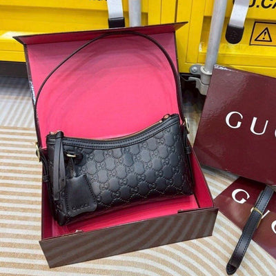 Gucci GG Emblem small shoulder bag hover